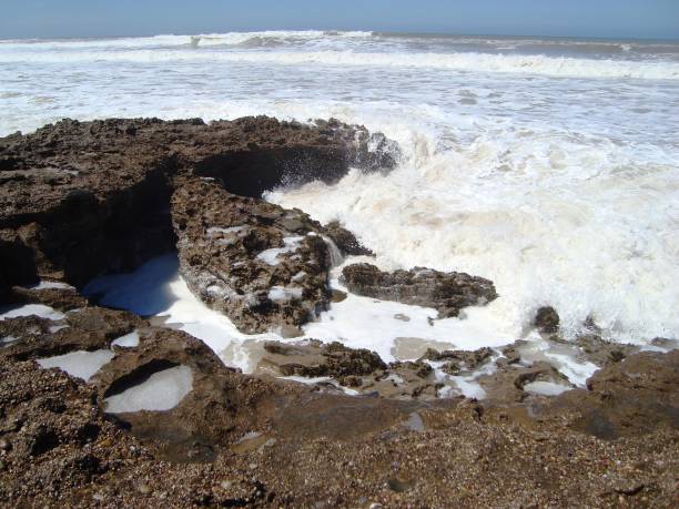 istock BEACH TAMARIS/MAREE HAUTE/ECUME/MOROCCO 940892304