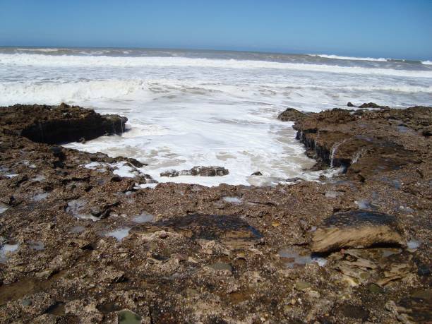 istock BEACH TAMARIS/MAREE HAUTE/ECUME/MOROCCO 940892382