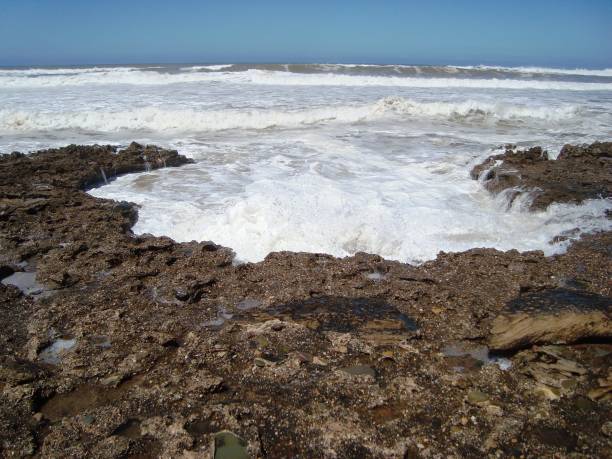 istock BEACH TAMARIS/MAREE HAUTE/ECUME/MOROCCO 940892490