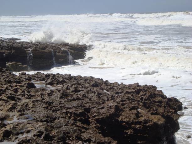 istock BEACH TAMARIS/MAREE HAUTE/ECUME/MOROCCO 940892714