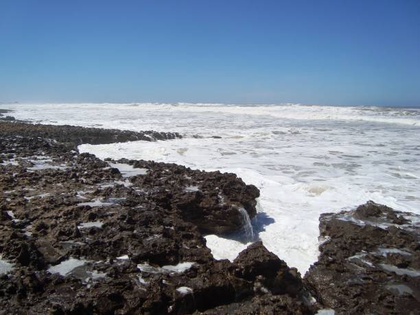 istock BEACH TAMARIS/MAREE HAUTE/ECUME/MOROCCO 940895048