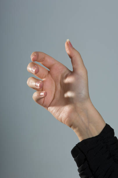 istock Empty Female Hand For Placing Mobile Phone Isolated Close Up 940895138