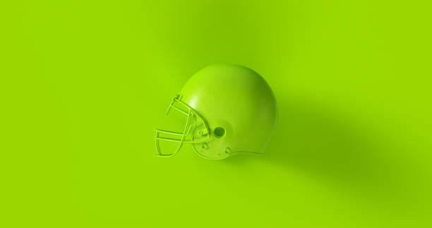 istock Green American Football Helmet 940895426