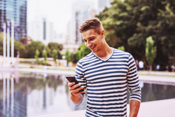 istock Man is texting to his friends 940902248