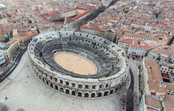 Panorama of the city of Nimes in France. Aerial view of ancient roman amphitheatre. stock photo