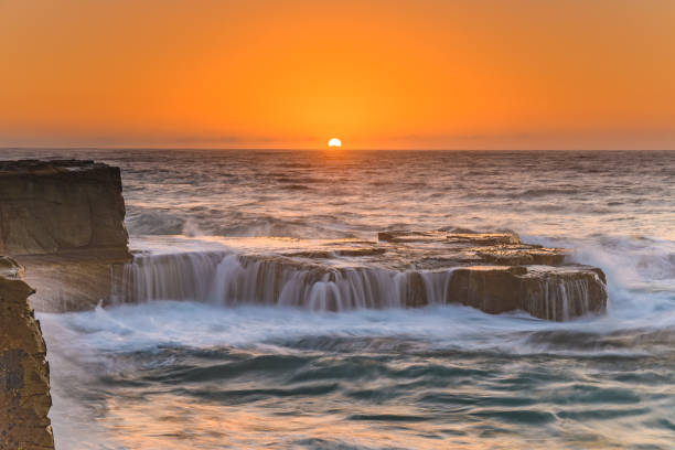 istock Sunrise Seascape and Cascades 940904992