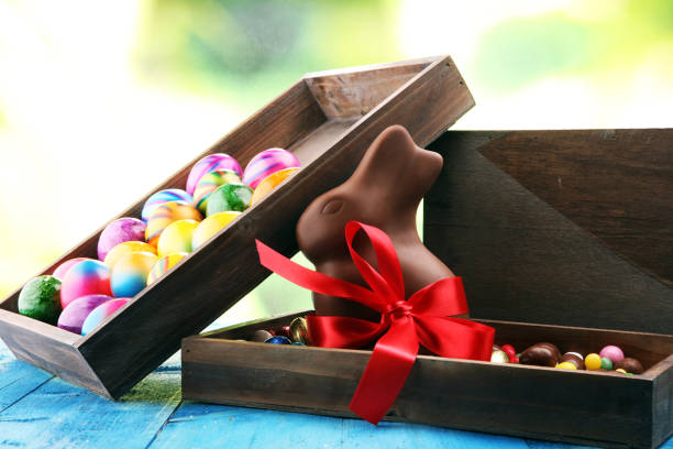 Chocolate Easter eggs and chocolate bunny and colorful sweets