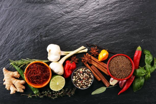 istock Spices and herbs on table. Food and cuisine ingredients. 940913820
