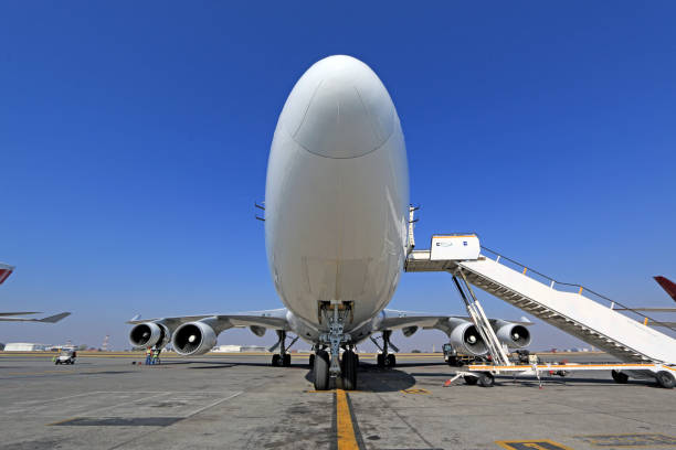 Madrid, Spain - 04 17 2024: Emirates Airline plane parked at gate, Madrid Barajas airport.