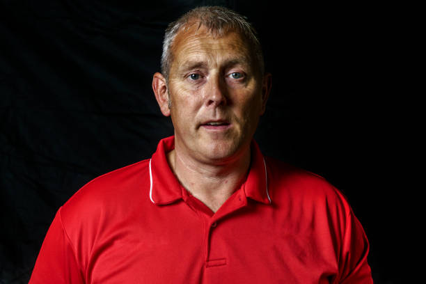 istock Mature blonde man portrait 940918978