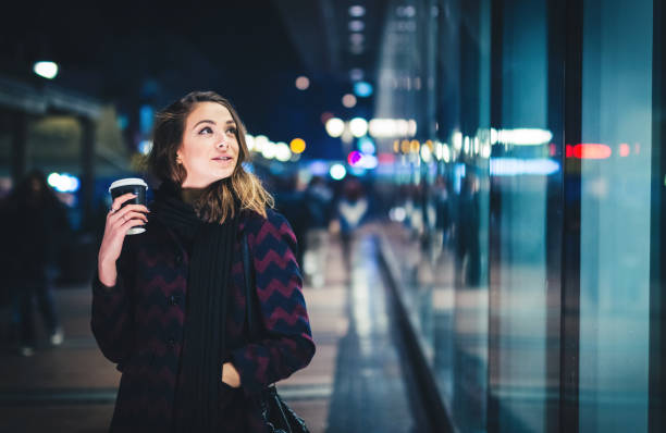 istock Girl Downtown at Night 940919996