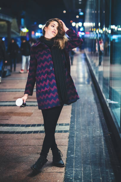 istock Girl Downtown at Night 940922280