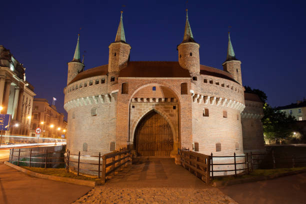 istock Barbican Fortification by Night in Krakow 940925536