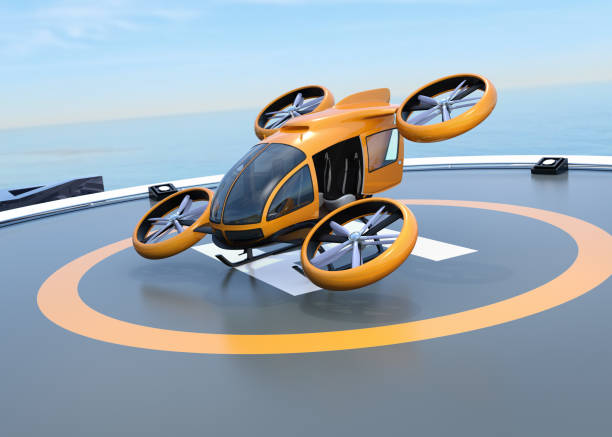 Orange self-driving passenger drone takeoff from helipad Orange self-driving passenger drone takeoff from helipad. 3D rendering image. tilt rotor stock pictures, royalty-free photos & images