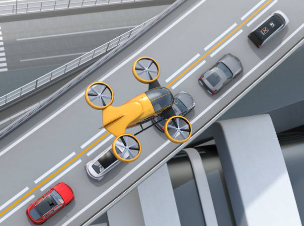 Top view of yellow passenger drone flying over cars in heavy traffic jam Top view of yellow passenger drone flying over cars in heavy traffic jam. Concept for drone taxi. 3D rendering image. tilt rotor stock pictures, royalty-free photos & images