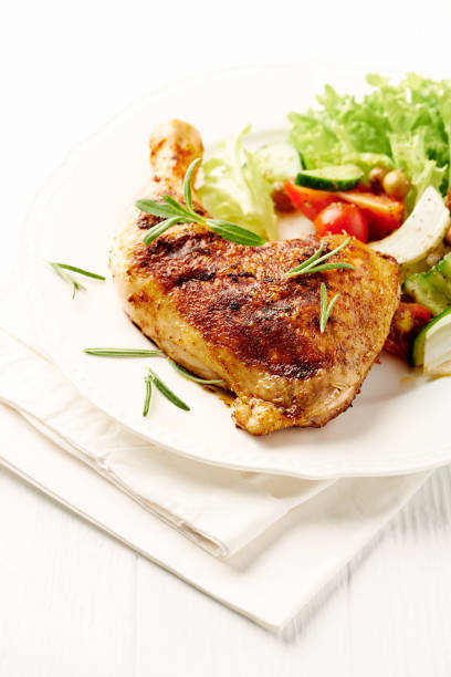 istock Roast chicken Leg with Salad 940932590