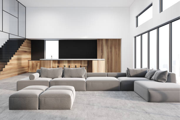 istock White living room and kitchen, gray sofa 940933630