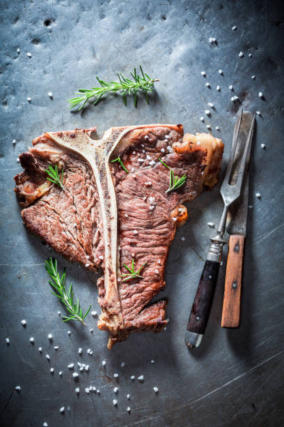 istock Fresh roasted tbone steak with salt and rosemary 940933664