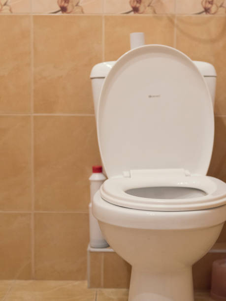 istock blurred dark toilet room and water closet 940934352