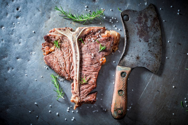 istock Delicious and fresh tbone steak with herbs and salt 940937066