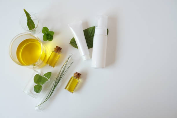 istock package with laboratory experiment and research with leaf, oil and ingredient  extract for natural beauty  and organic skincare product package,bio science concept. alternative medicine. spa 940940850