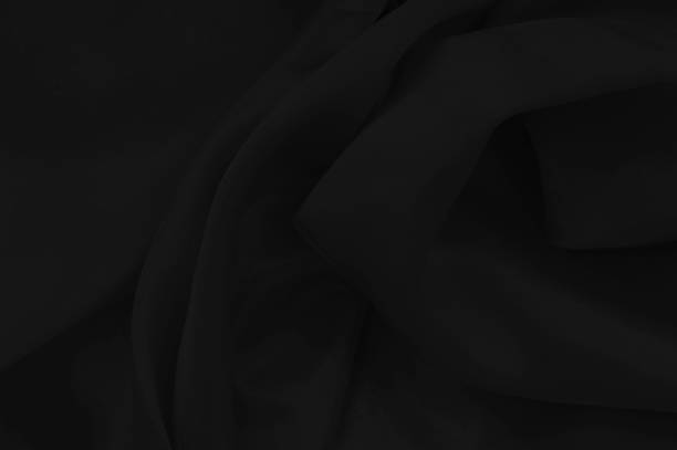 istock Black fabric texture for background and design, beautiful pattern of silk or linen. 940950422