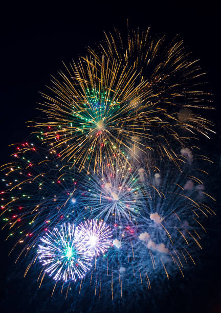 istock Festive multicolored salute on the background the dark night sky 940967210