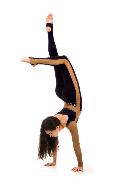 istock Acrobat, a circus artist in a dark suit. 940980808