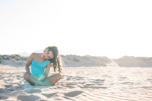 istock little girl vacationing on the beach 940981014