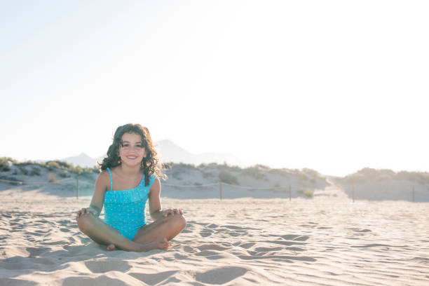 istock little girl vacationing on the beach 940981068