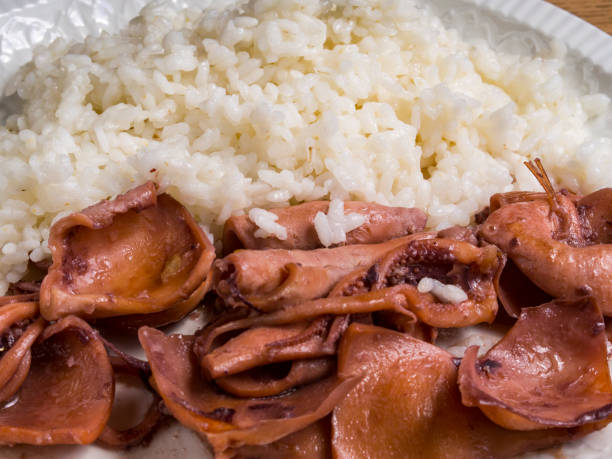 istock Stewed squid with white rice in the plate 940981452