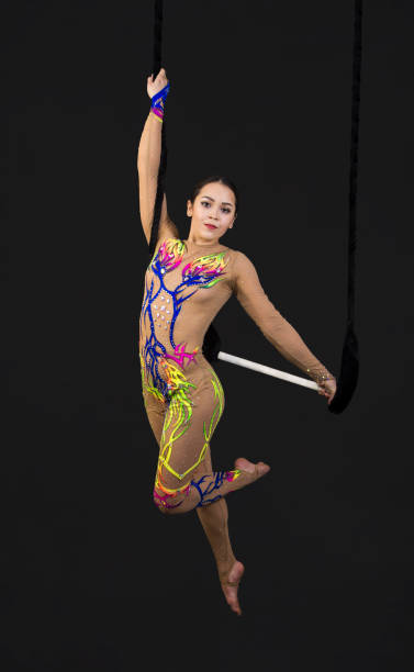 istock Aerial acrobat in the trapeze. 940981872
