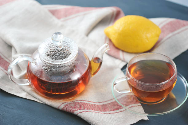 istock black Bayh tea with lemon in glass teapot 940982536