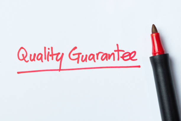 istock Handwriting of quality guarantee 940986056