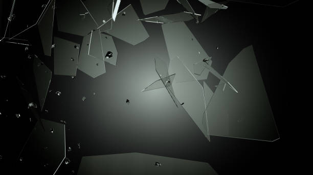 istock Broken and damaged glass isolated on black background 940986322
