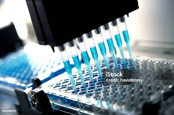 Medical Research And Pharmaceutical Research Robotic Pipette Device Stock Photo - Download Image Now