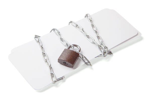 istock Flights wrapped in chains and locked. Isolated over white background 940995778