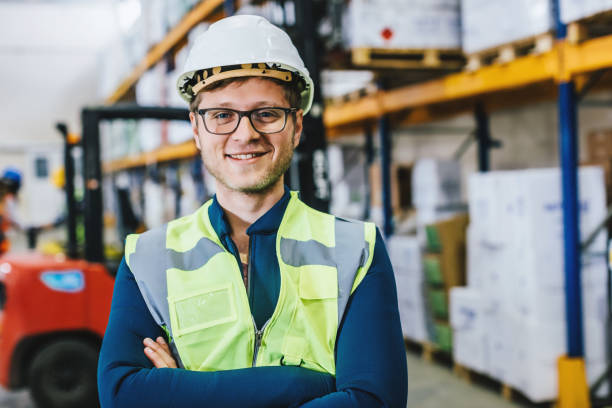 istock Portrait of industry manual worker in warehouse 940996140