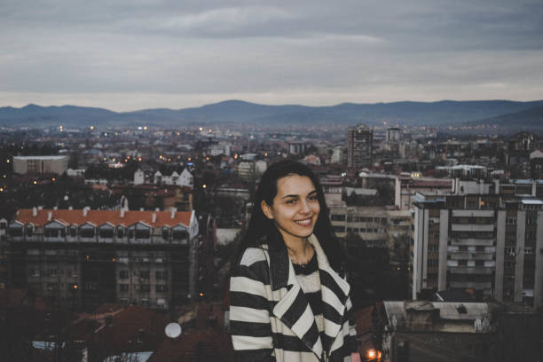 istock A women in a black and white winter coat 940996246