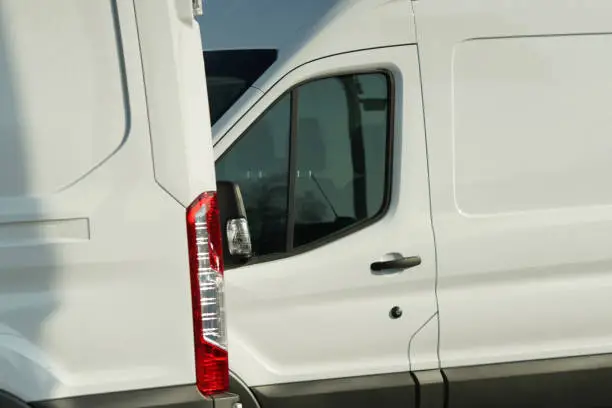 Photo of Parked white vans