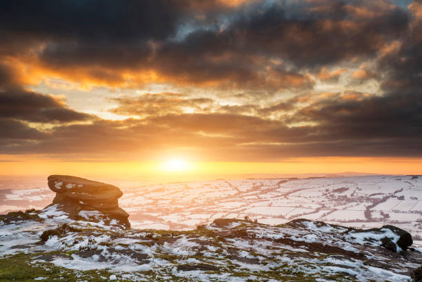 istock Stunning Winter sunset over snow covered Winter landscape in Peak District 941012194