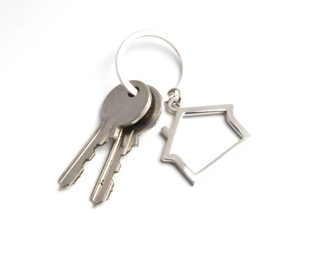 istock house key  isolated on white background 941012538
