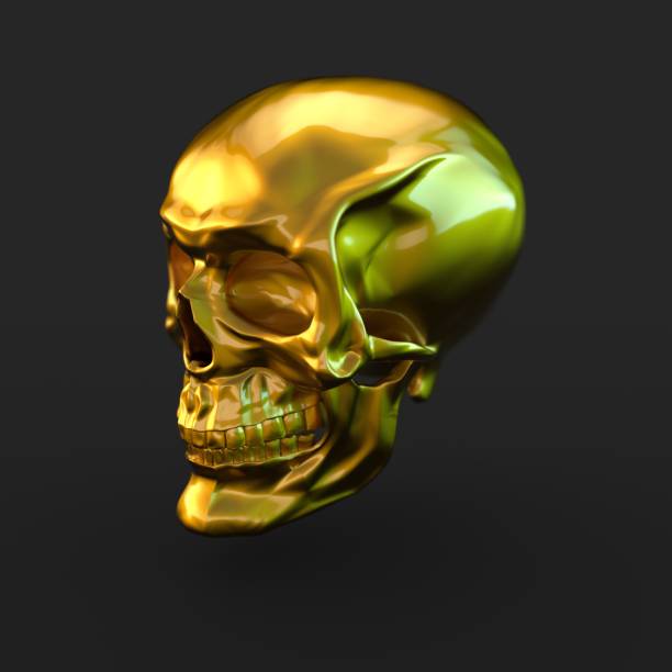 istock Golden glossy skull with light reflections isolated on black background 941013316