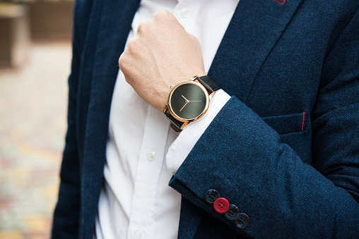 Elegant man in blue suit, business man's hand with fashion no brand wrist watch, men fashion and accessories closeup shot
