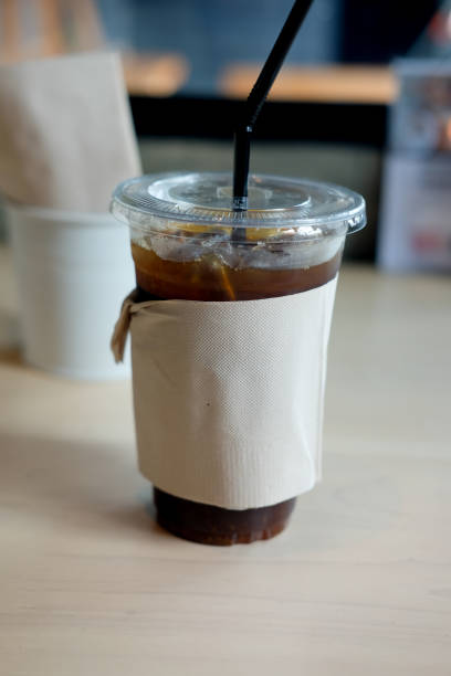 istock Iced black coffee put on wood table 941018218