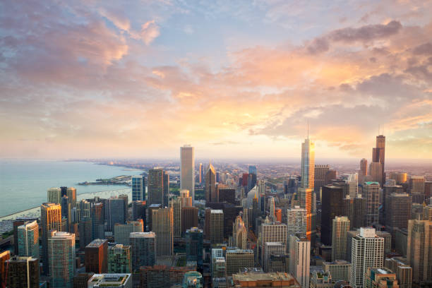 Chicago sunset time Chicago skyline at sunset time aerial view, United States chicago illinois stock pictures, royalty-free photos & images