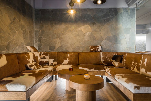 istock Interior design of restaurant with big cowhide sofa 941025912