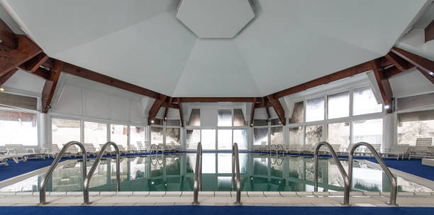 istock Luxury swimming pools in modern hotel 941026120