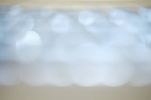 istock Abstract white bokeh light background. Bokeh light for Christmas concept.copy space 941038690