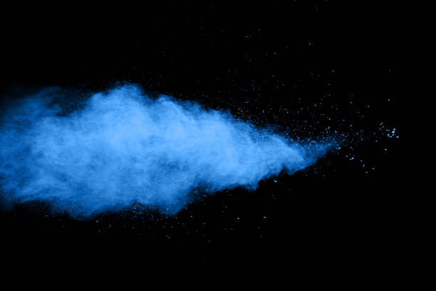 istock abstract blue dust explosion on  black background ,abstract blue powder splattered on black background , Freeze motion of blue powder exploding. 941039778